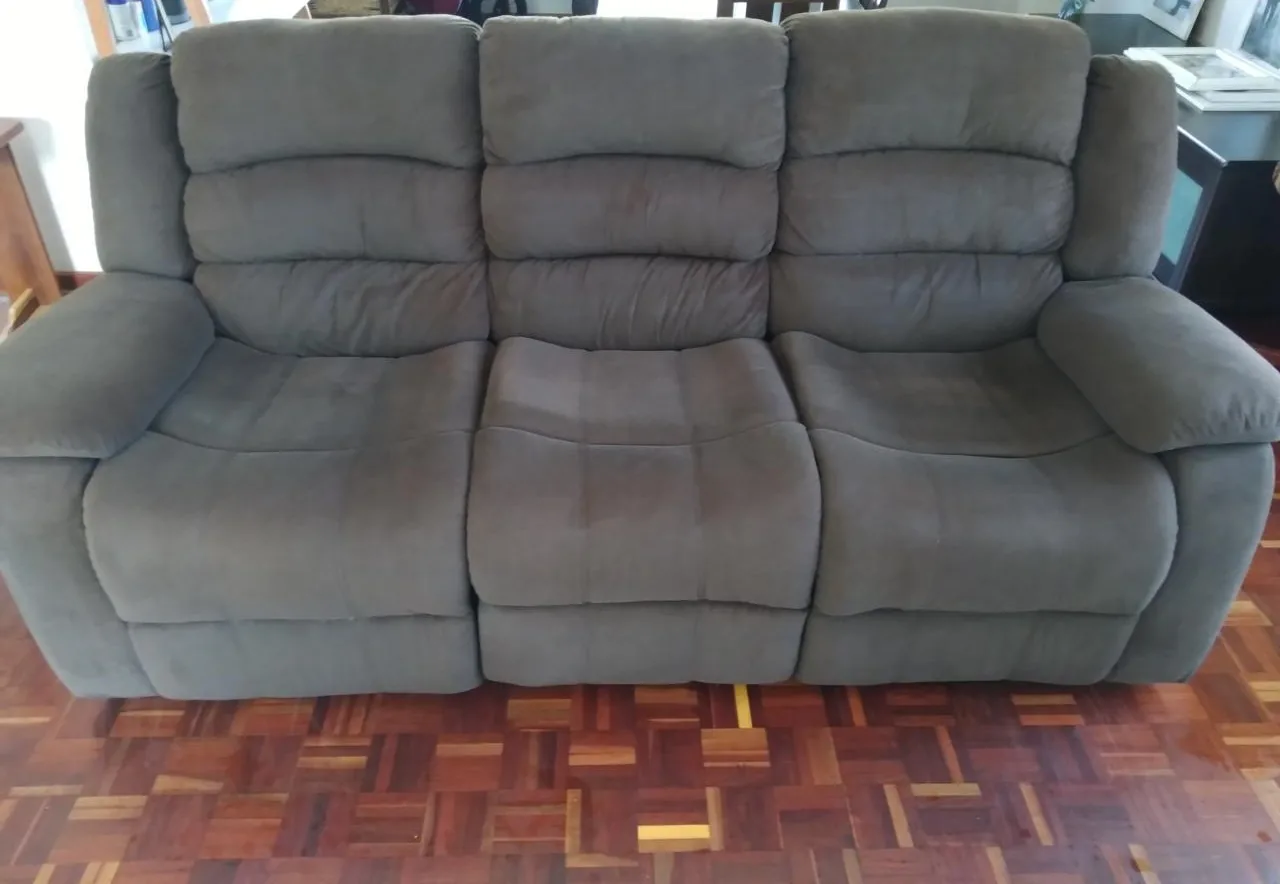 Grey upholstered couch after cleaning